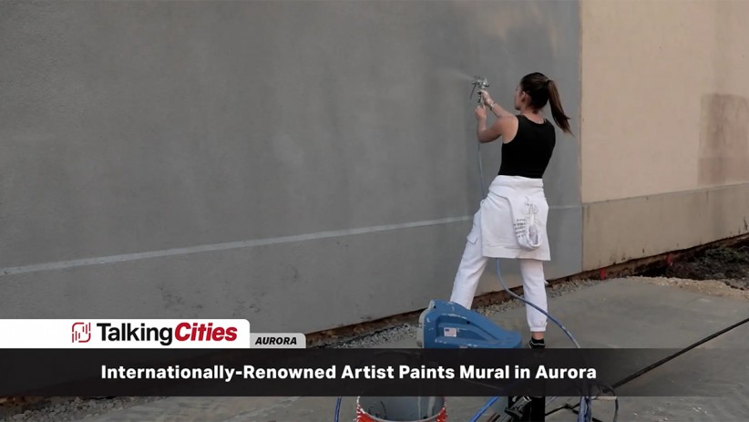 Internationally-Renowned Artist Paints Tribute Mural in Downtown Aurora