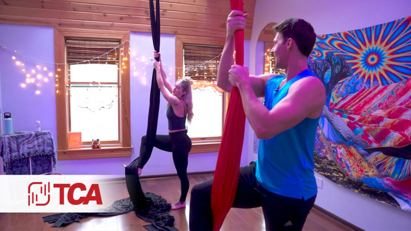 Silks, Twirls, Stretching, and a Workout All Wrapped into One Crazy Aerial Fitness Trend
